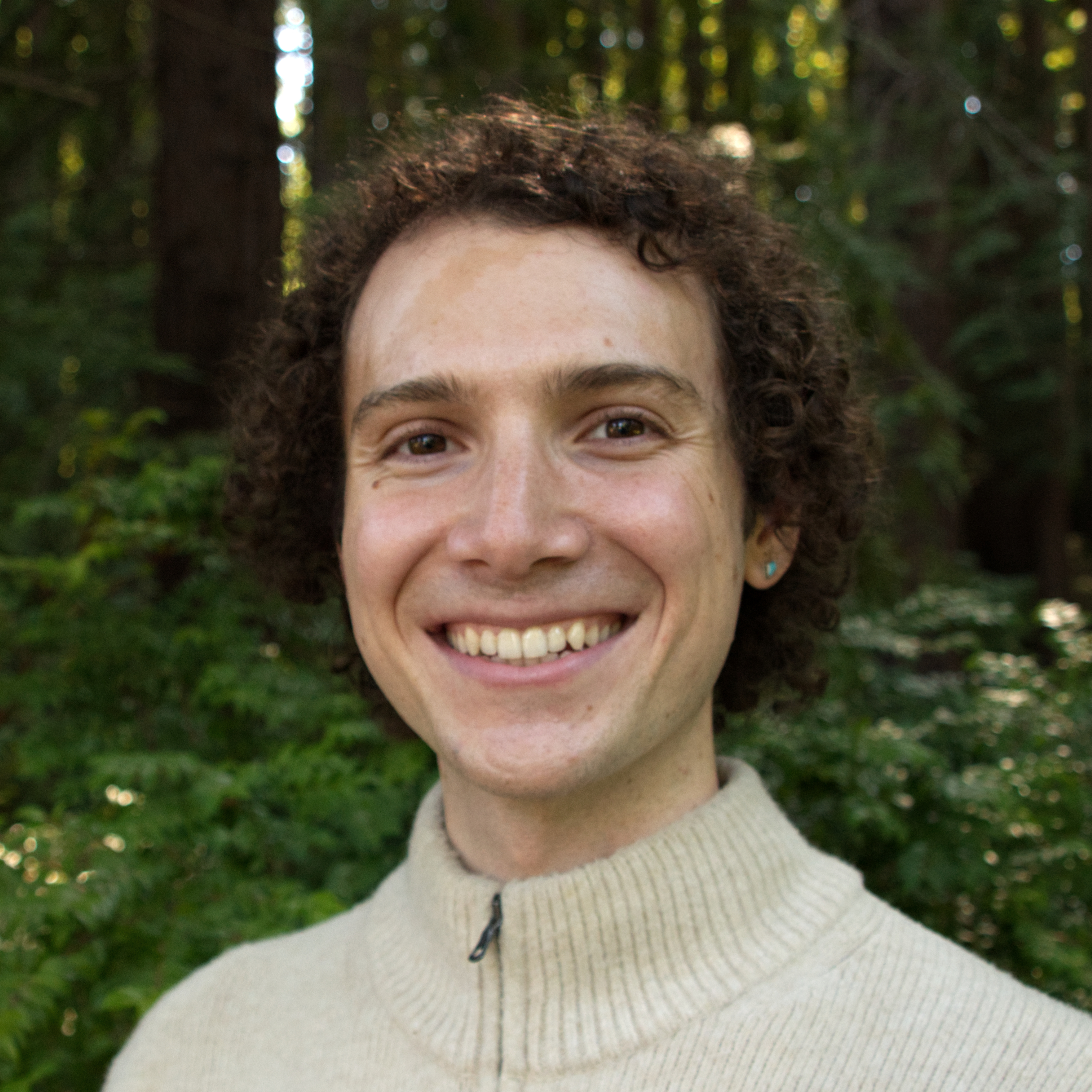 A close-up photo of Justin Lubin smiling.